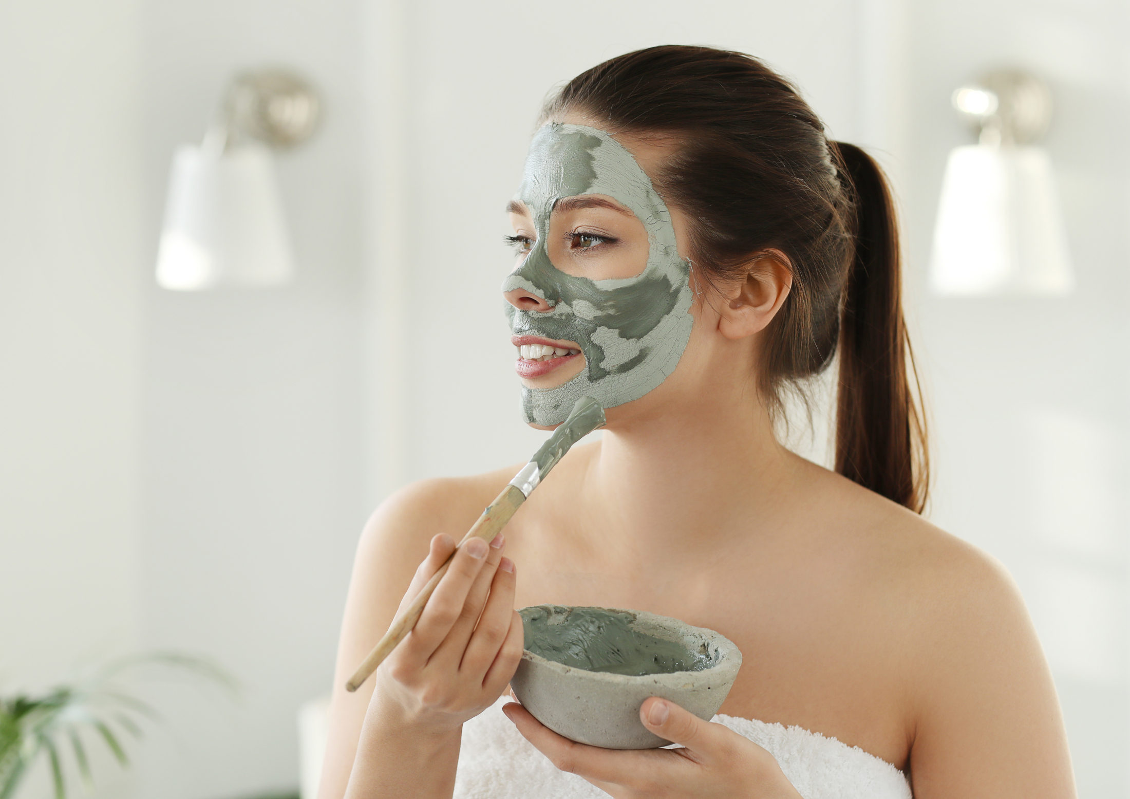 woman-with-facial-mask-skin-care-beauty-concept.jpg