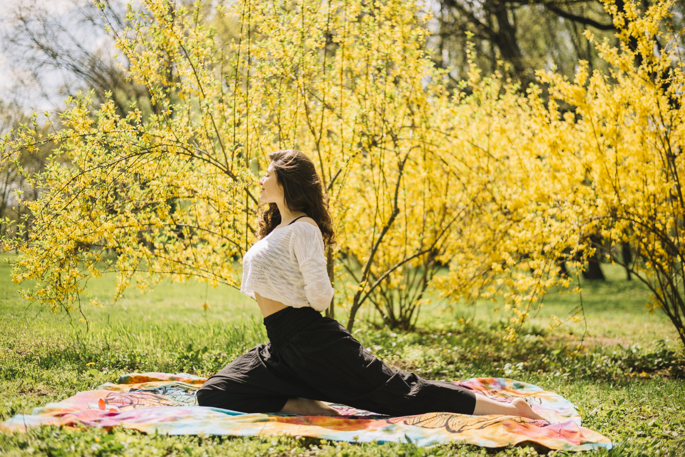 side-view-woman-stretching-her-body-while-exercising-park.jpg