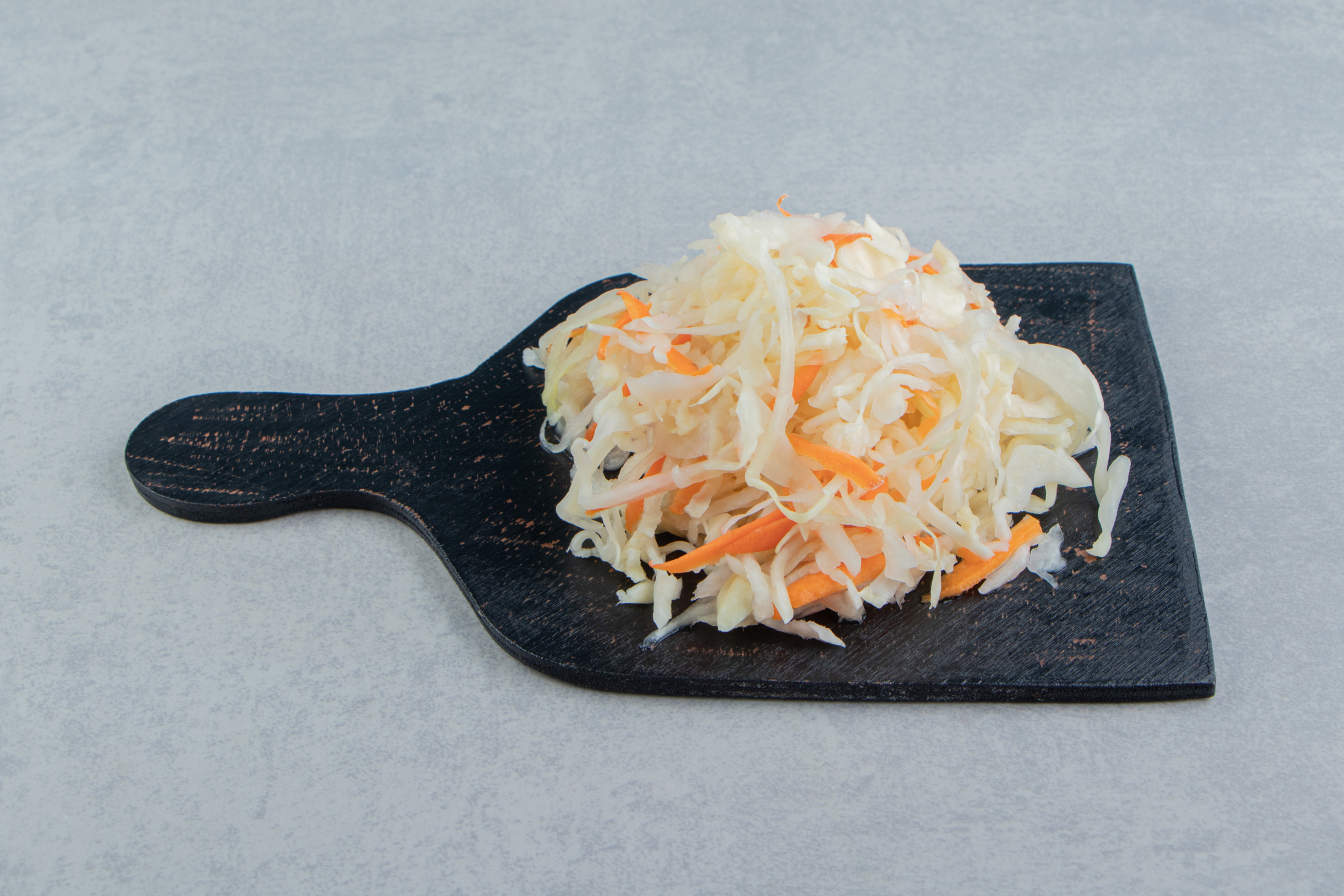 sauerkraut-cutting-board-marble-surface.jpg