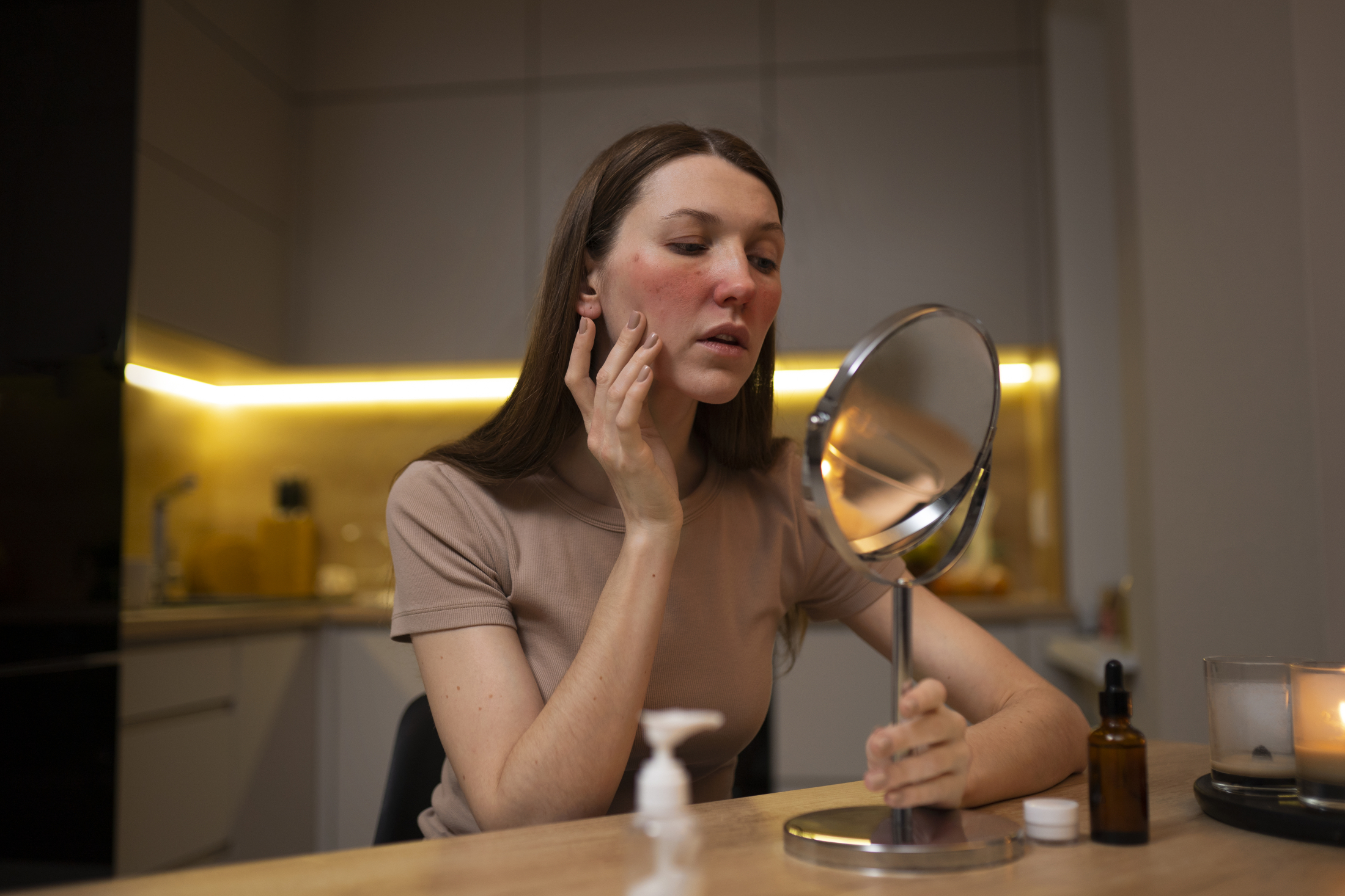 woman-looking-her-rosacea-mirror.jpg