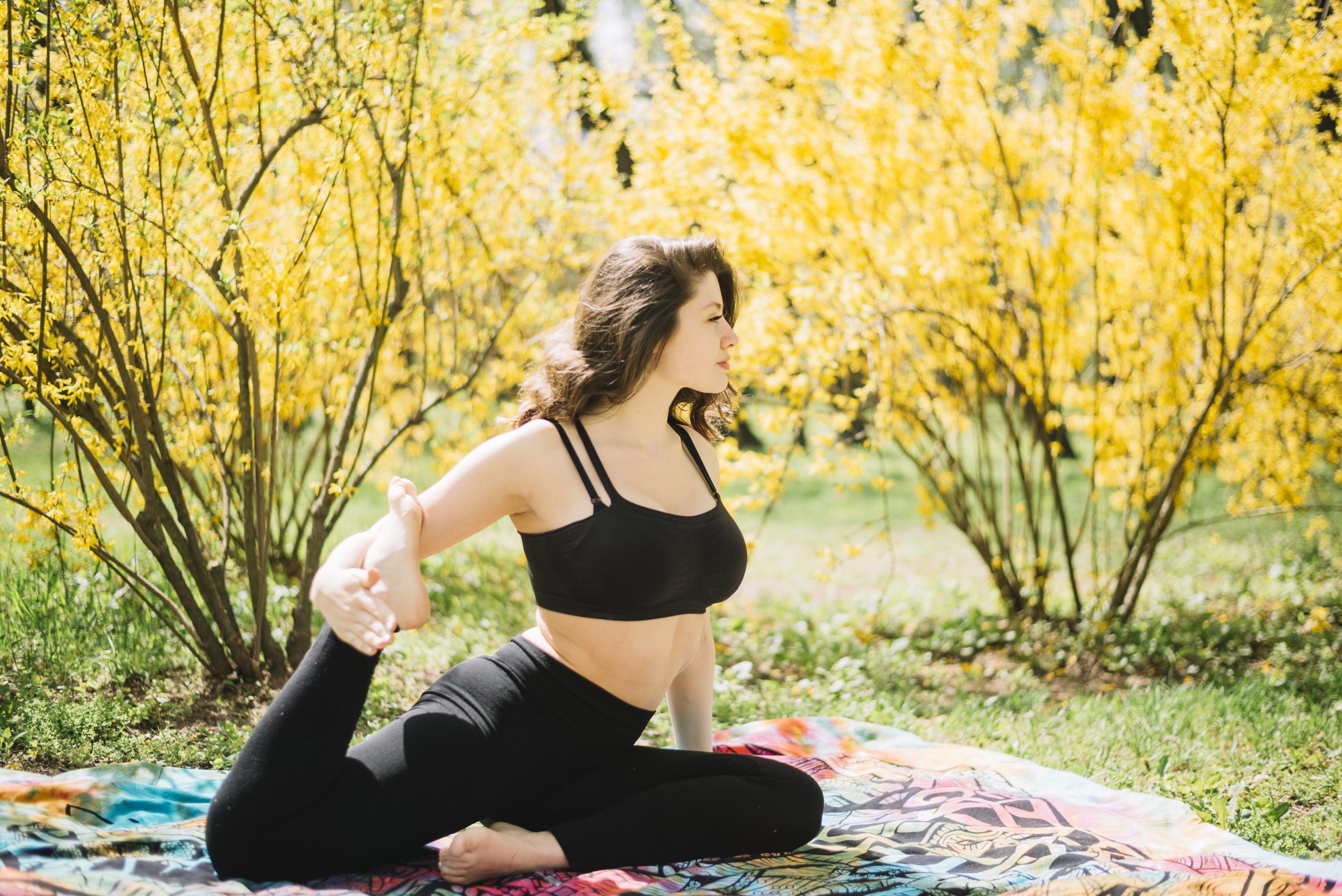 beautiful-young-woman-stretching-her-leg-garden.jpg