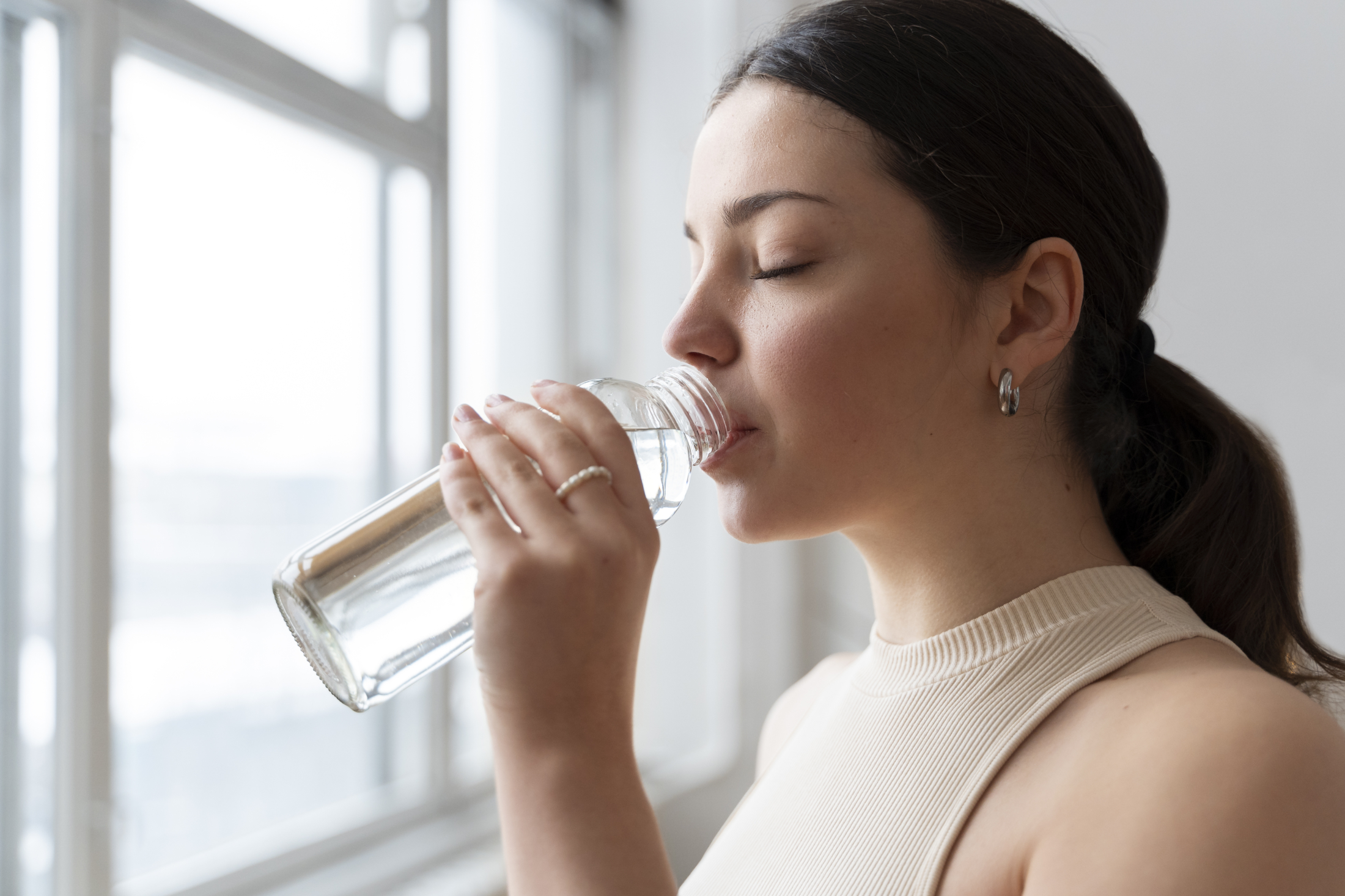 woman-drinking-water-after-exercise (3).jpg