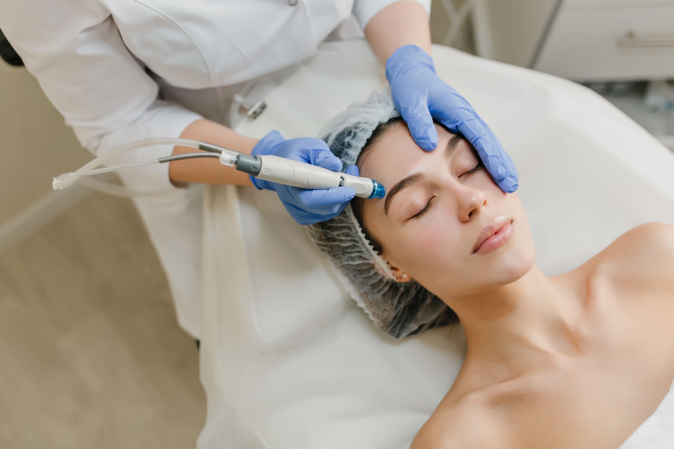view-from-rejuvenation-beautiful-woman-enjoying-cosmetology-procedures-beauty-salon-dermatology-hands-blue-glows-healthcare-therapy-botox.jpg