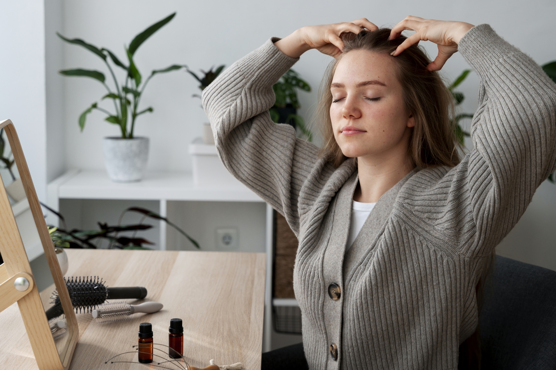 woman-giving-herself-scalp-massage (1).jpg