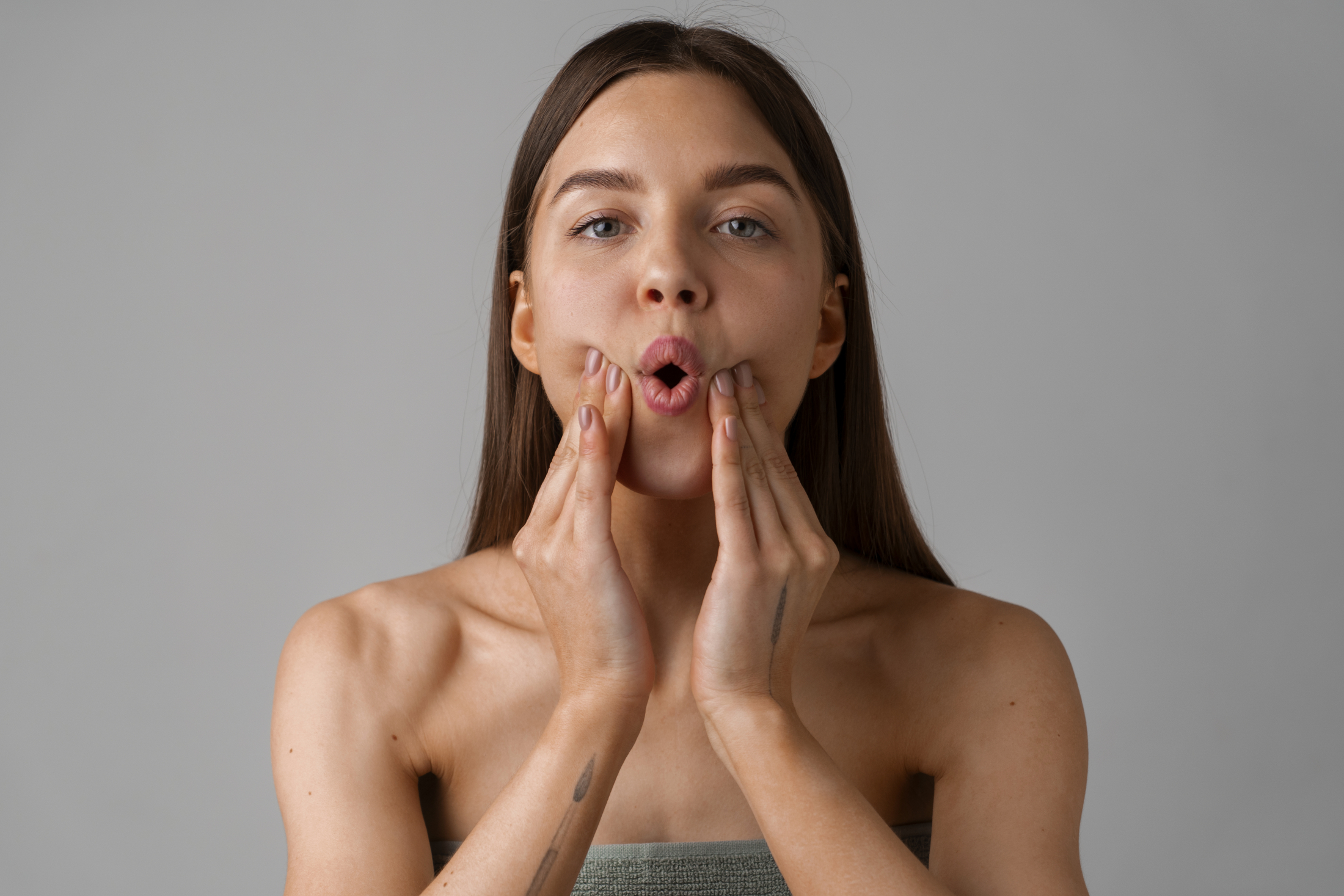 portrait-young-woman-practicing-facial-yoga-youth (2).jpg