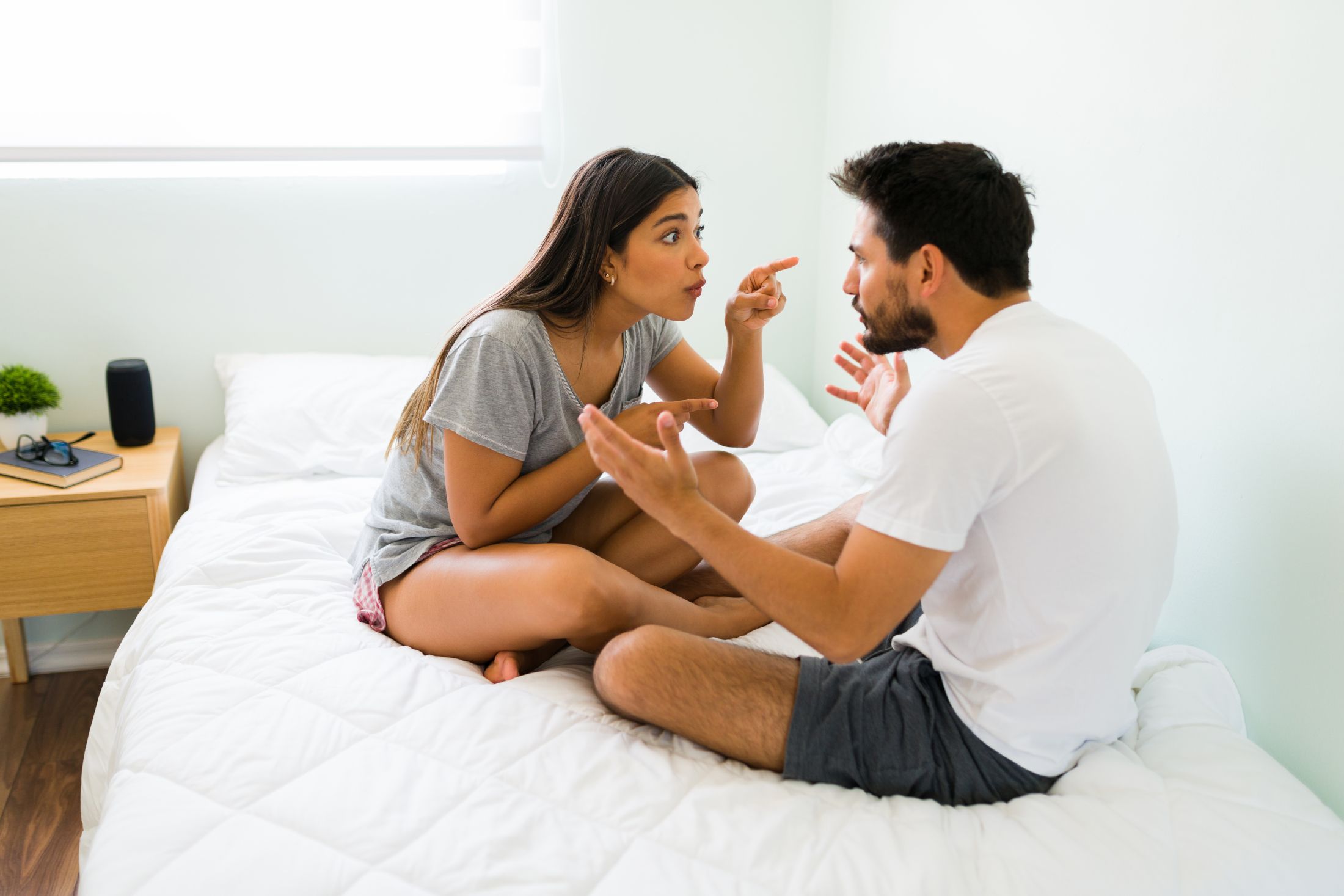 you-are-the-one-to-blame-resentful-young-woman-demanding-something-from-her-boyfriend-while-arguing-in-the-bedroom.jpg