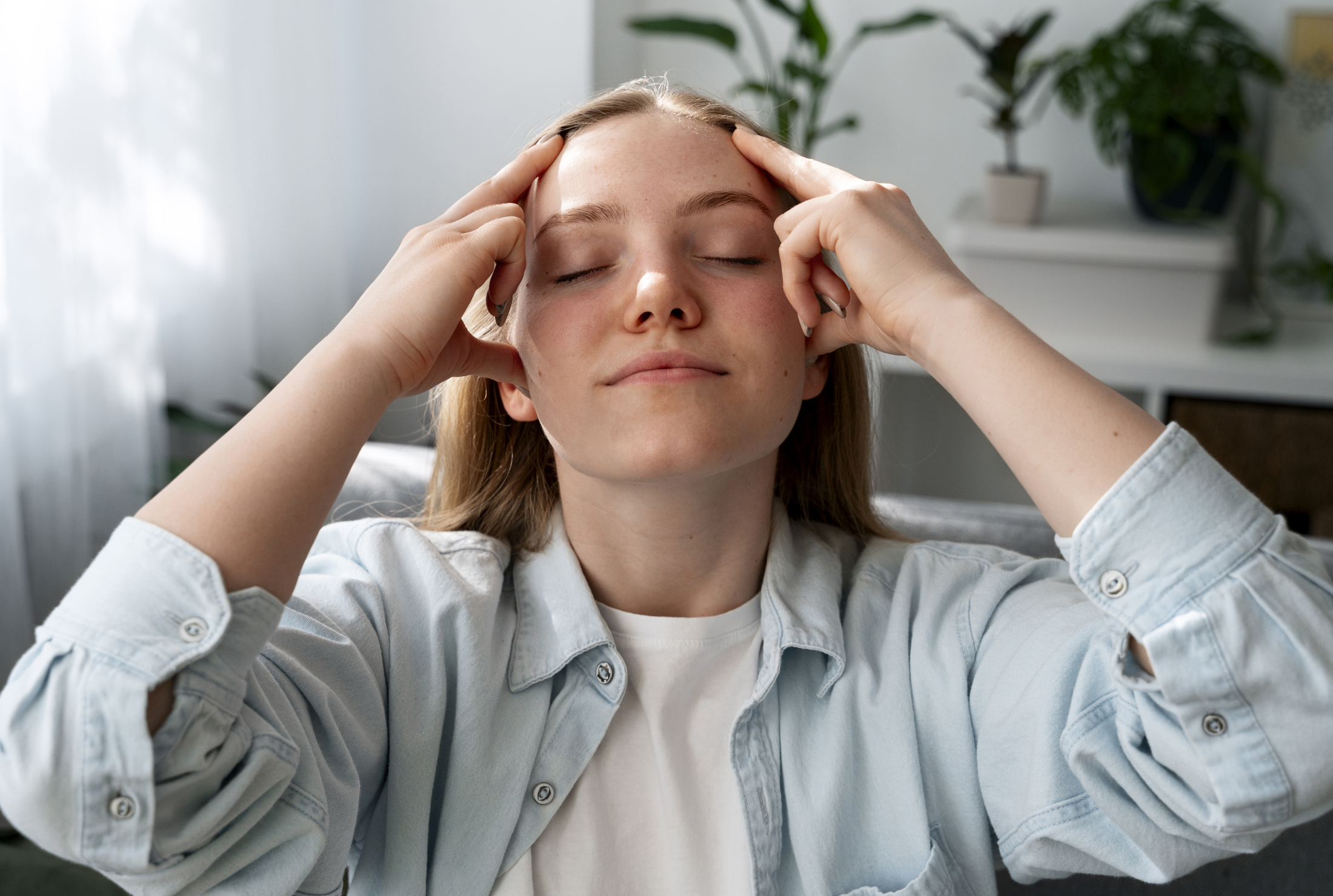 woman-giving-herself-scalp-massage.jpg