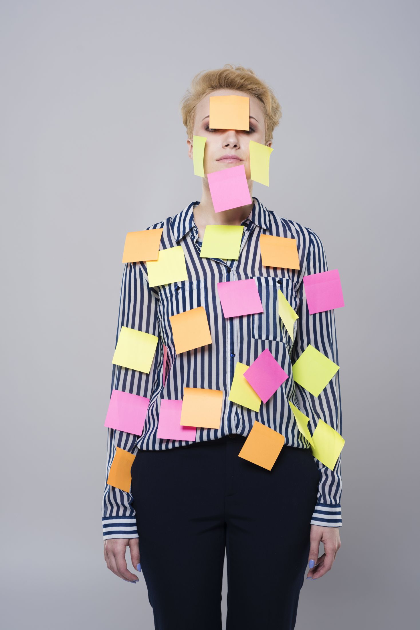 multi-tasking-woman-with-colorful-papers.jpg