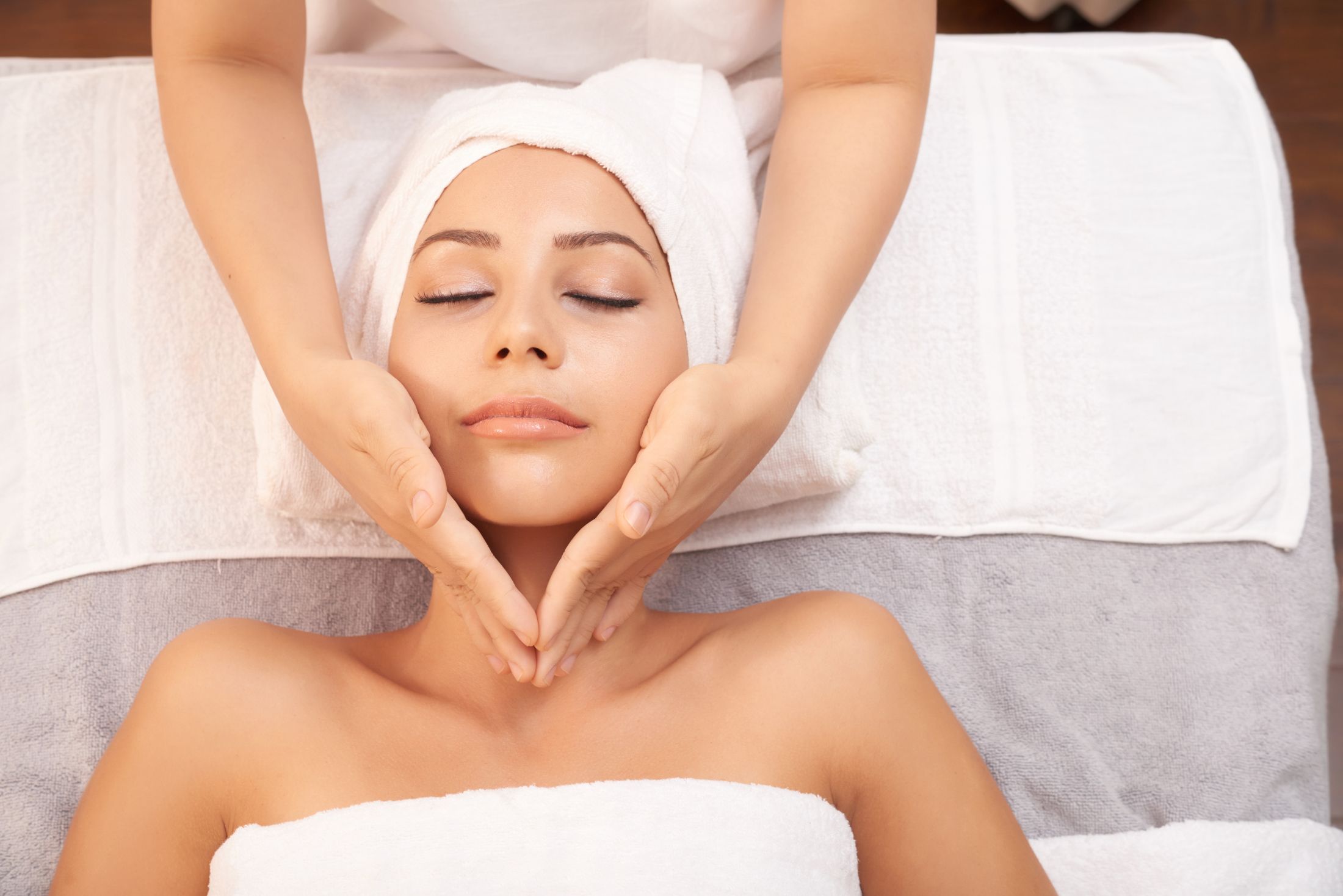 beautiful-caucasian-woman-getting-anti-age-massage-spa-salon.jpg