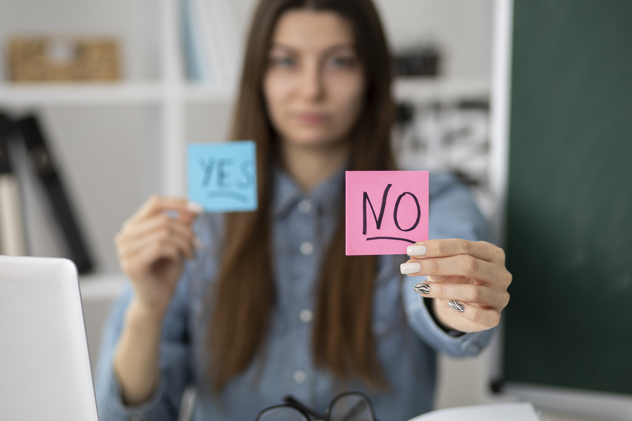 medium-shot-blurry-woman-holding-post-its.jpg