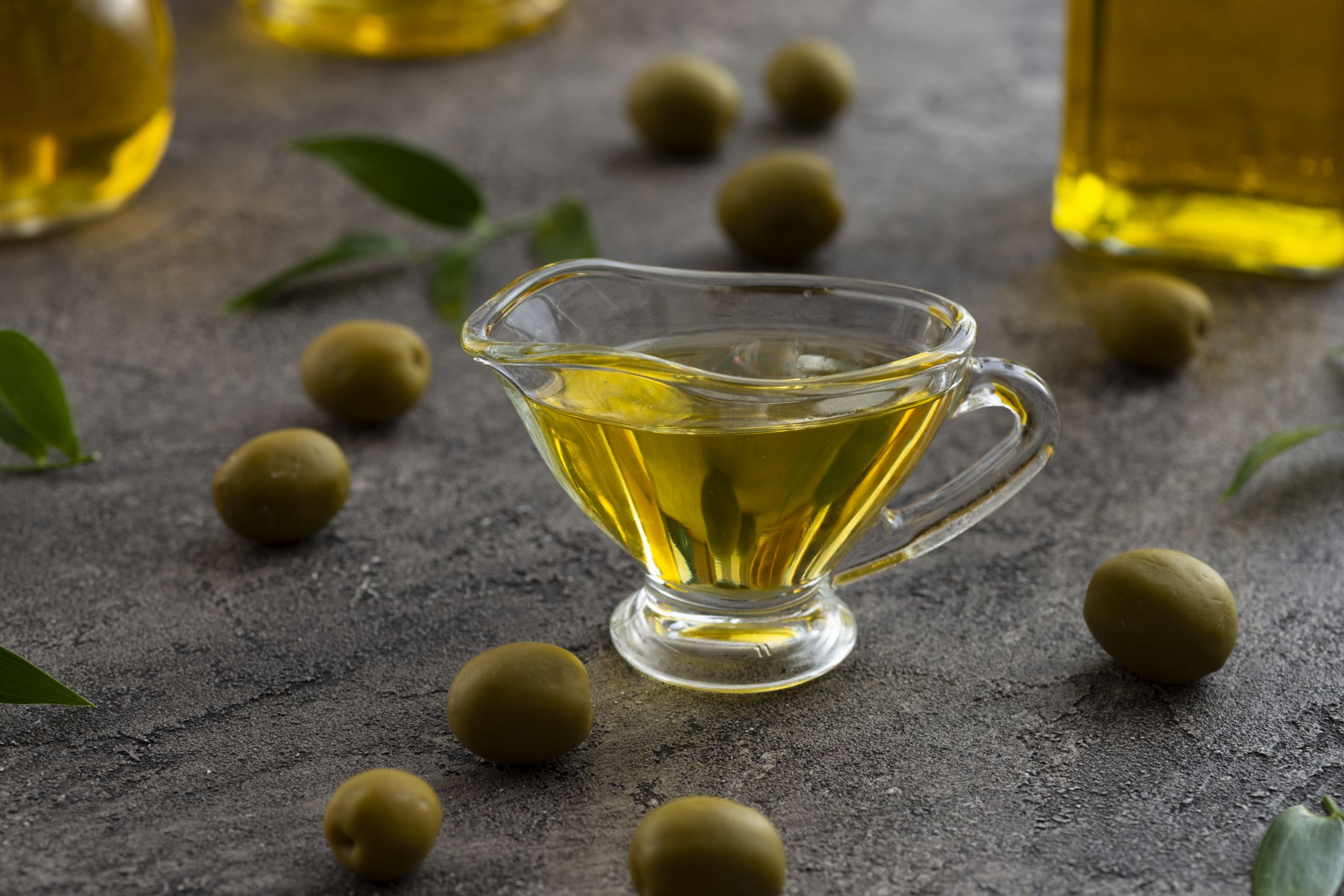 assortment-olive-oil-glass-green-olives.jpg