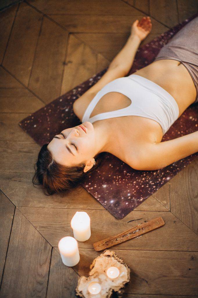 woman-relaxing-in-yoga-mat-3822647.jpg