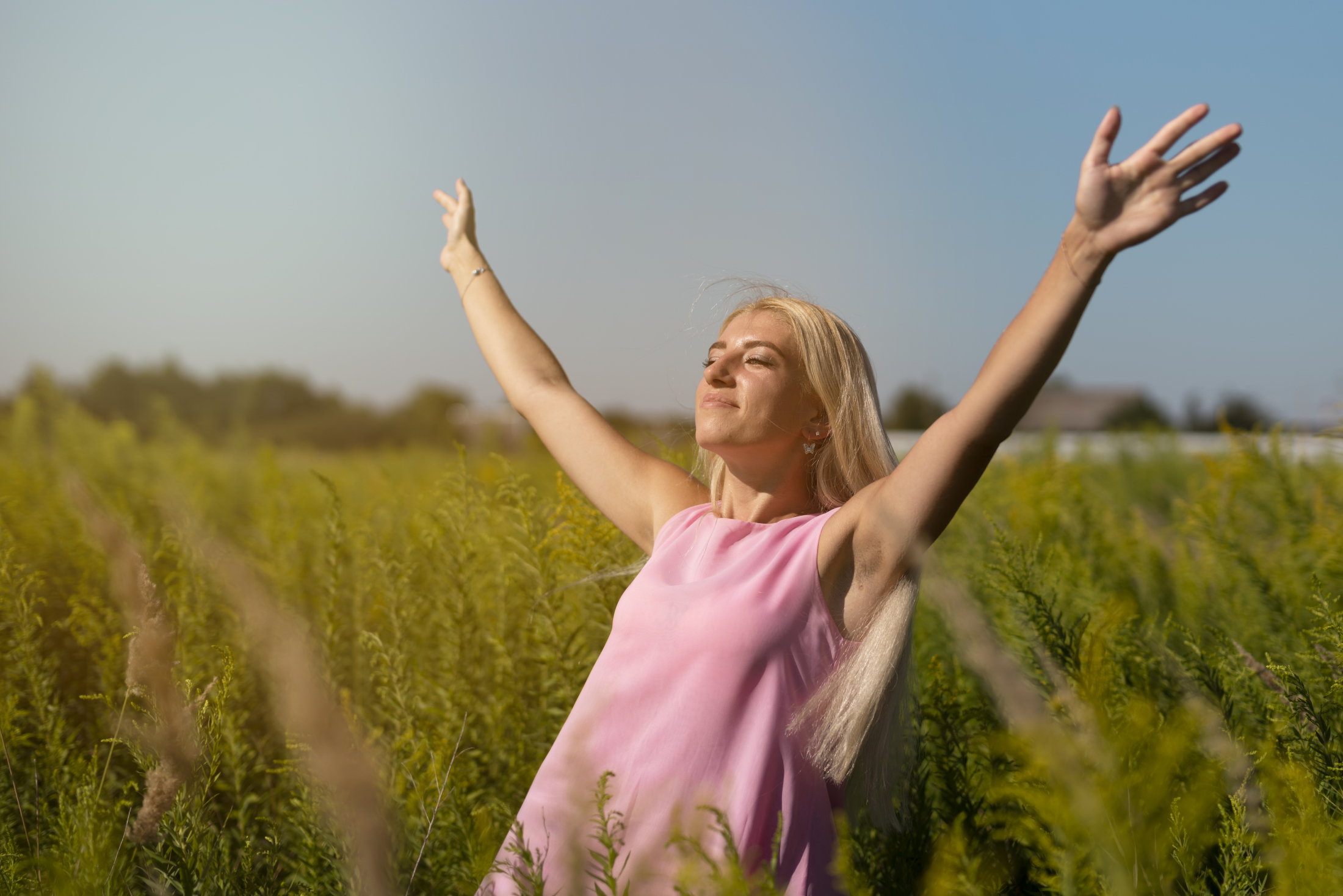 young-blonde-woman-enjoying-sun.jpg