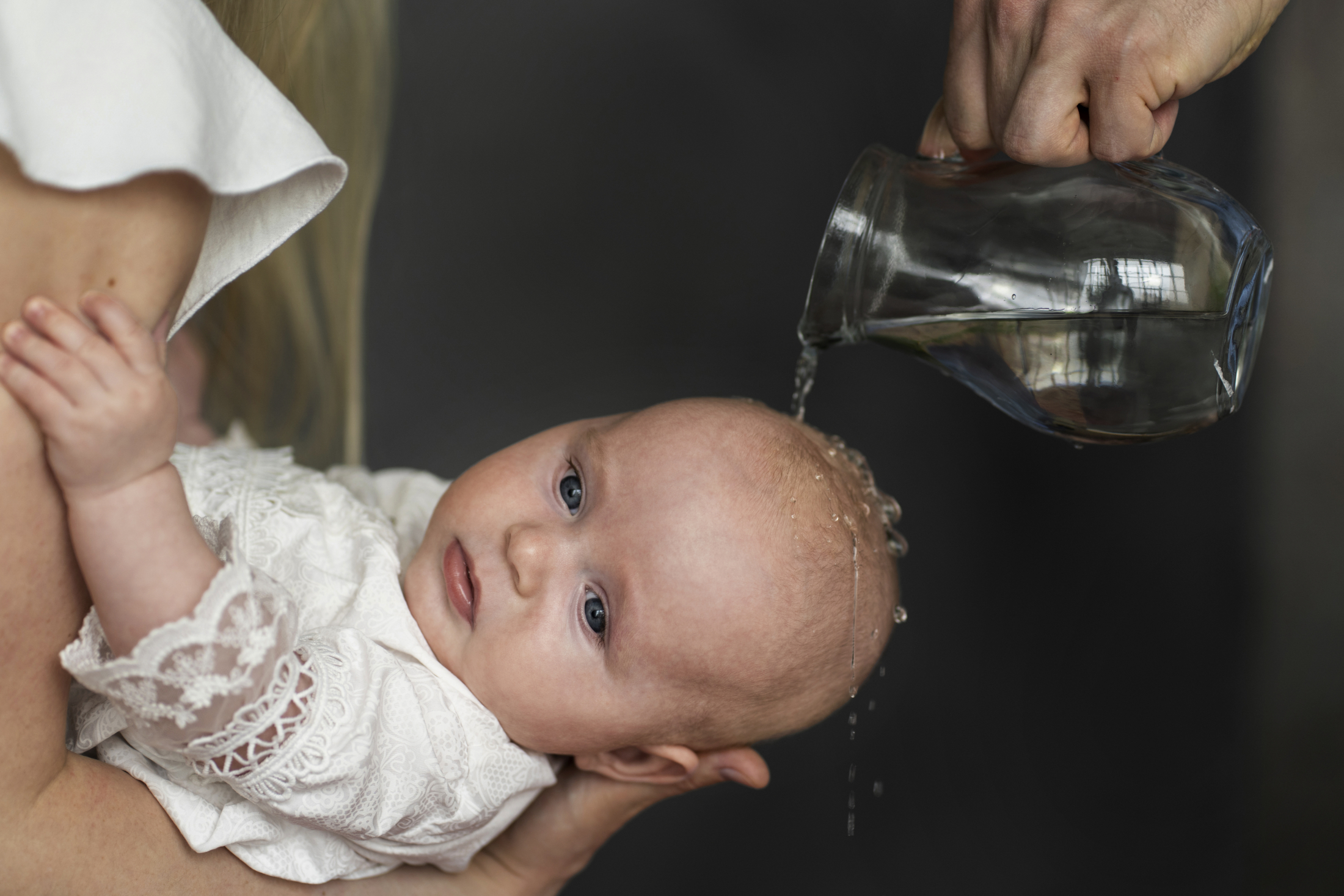 side-view-baby-baptism-scene.jpg