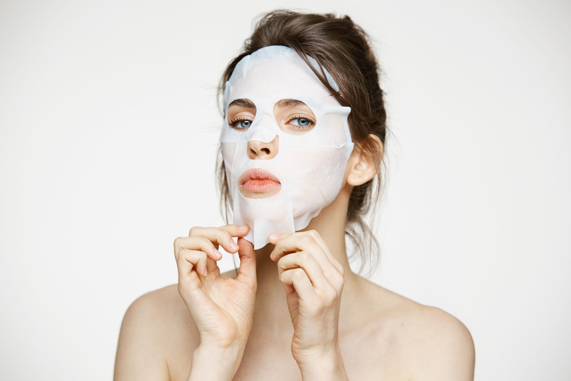 young-woman-with-facial-mask-beauty-spa-cosmetology.jpg