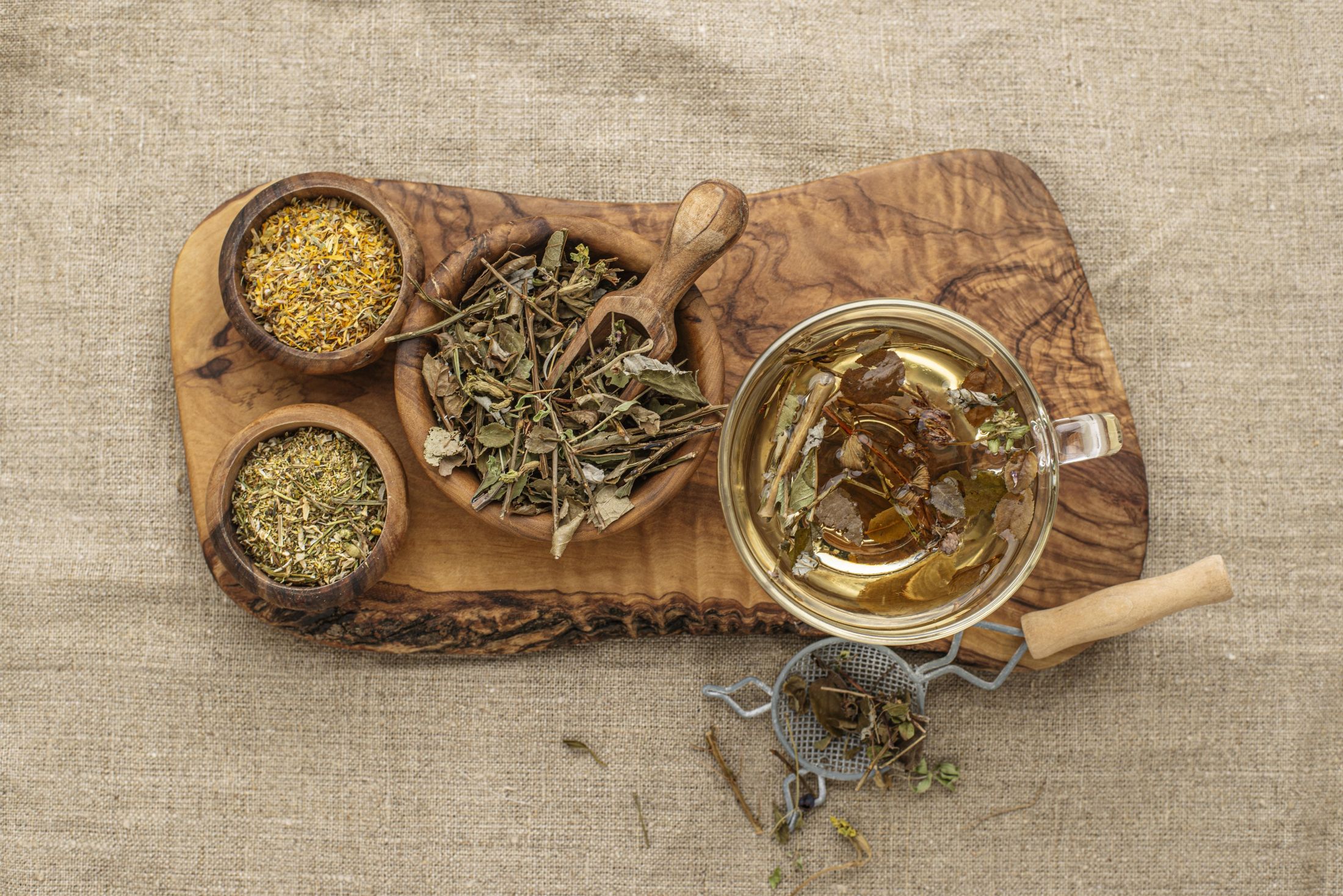 flat-lay-assortment-of-dried-plants-in-cup-of-teas.jpg