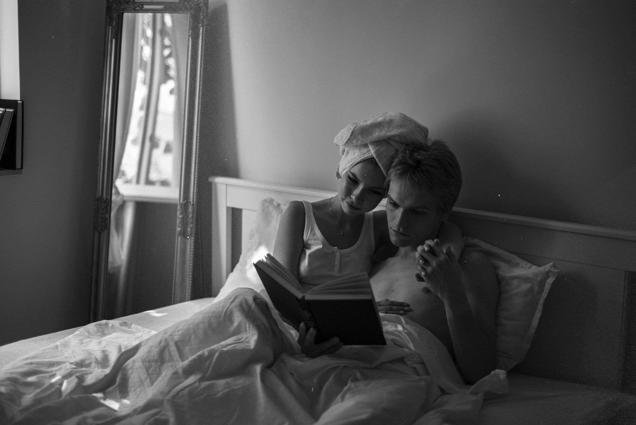 medium-shot-couple-reading-together.jpg