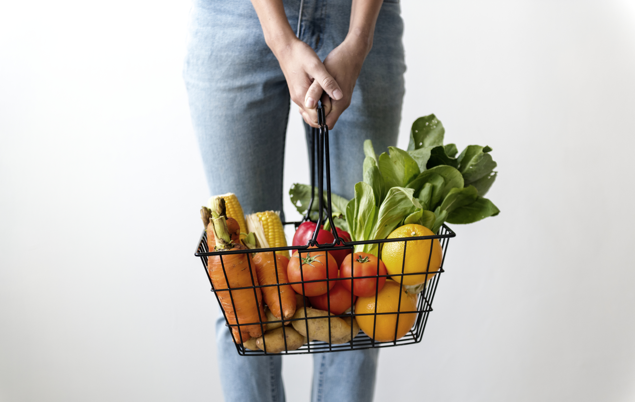 woman-holding-basket-vegetables.jpg