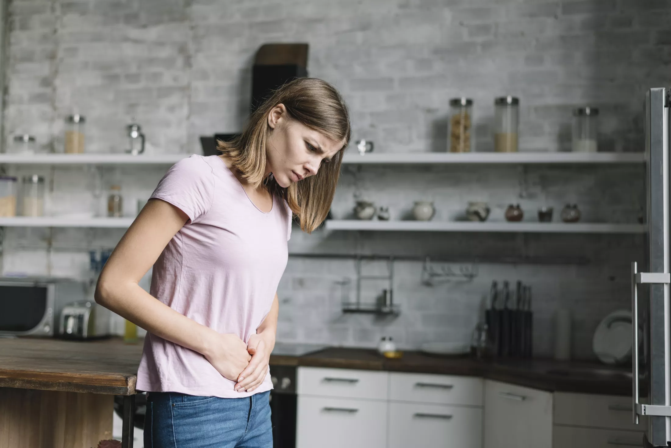 young-woman-suffering-from-stomach-pain.jpg